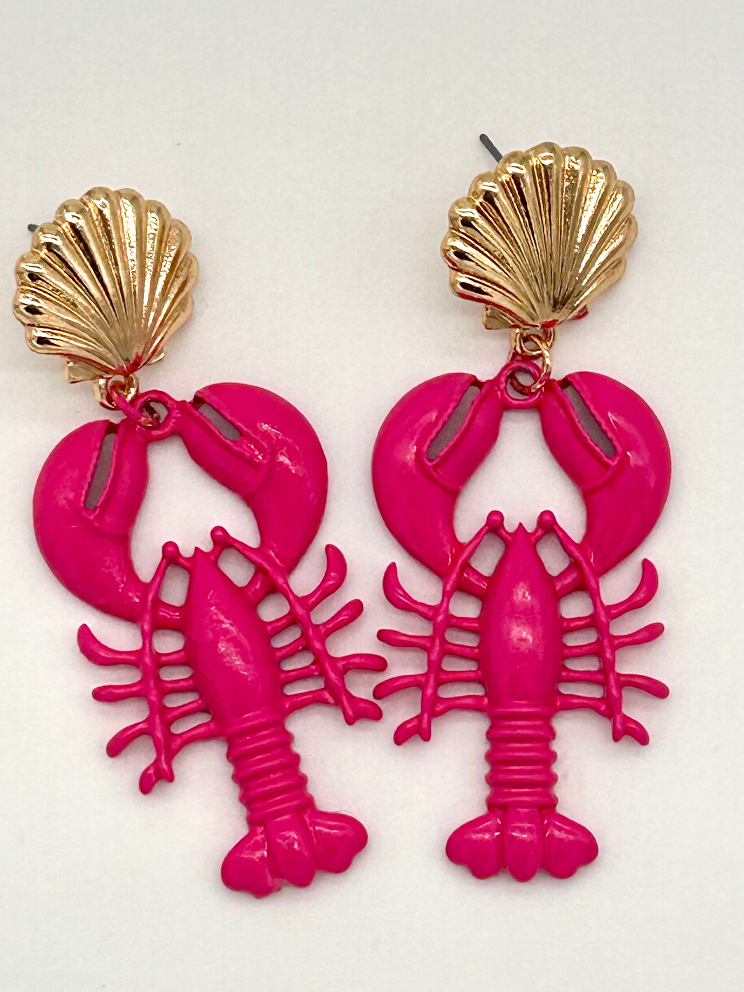 Earrings with gold shell